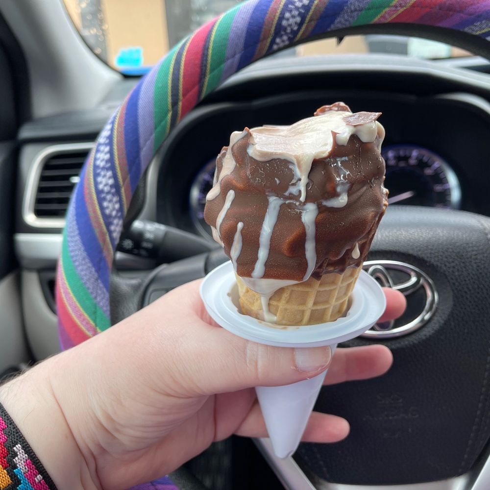 Medium chocolate dipped waffle cone with chocolate peanut butter swirl ice cream. Medium chocolate dipped waffle cone with chocolate peanut butter swirl ice cream.