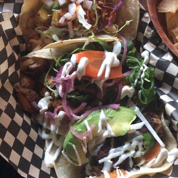 Tacovore - From top to bottom: seafood taco (tiny bay shrimps), chicken taco, and carnitas taco - Mexican Near Me - Eugene, Oregon