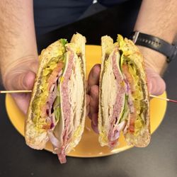 Greg's Sandwich Works - Build your own sandwich Turkey Salami Provolone Cheese Mayo  Mustard Lettuce Tomato Onion Oil Vinegar Jalapeños Mild Peppers