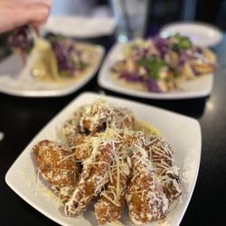 The Alibi Bar & Cafe - Garlic & parmesan wings