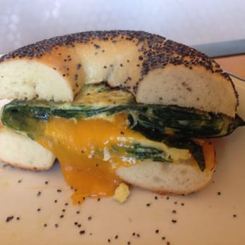 Wise Sons - Braised greens are folded into the egg rather than put on top. Recents sandwich slippage. - Breakfast & Brunch Near Me - Oakland, California Wise Sons - Braised greens are folded into the egg rather than put on top. Recents sandwich slippage. - Breakfast & Brunch Near Me - Oakland, California