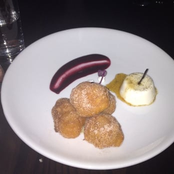 Salinas - Dessert. Bunuelos. Cream puffs filled with passion fruit, rum panna cotta and red berries coulis. Good! - Spanish Near Me - New York, New York Salinas - Dessert. Bunuelos. Cream puffs filled with passion fruit, rum panna cotta and red berries coulis. Good! - Spanish Near Me - New York, New York