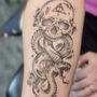 Photo of Green Fox Tattoo