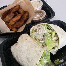 Wedges, mum's gravy, Caesar chicken wrap with extra Caesar dressing