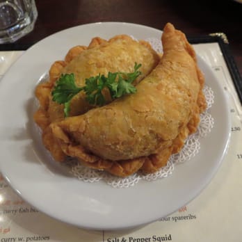 Mamak - A2. Curry Puff Pastry - pastry with curry chicken, onions, and potato. - Malaysian Near Me - Doraville, Georgia Mamak - A2. Curry Puff Pastry - pastry with curry chicken, onions, and potato. - Malaysian Near Me - Doraville, Georgia