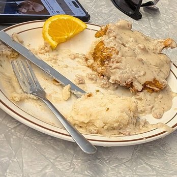 Home Grown - Fried chicken breast on biscuits with gravy... This is half - Diners Near Me - Atlanta, Georgia Home Grown - Fried chicken breast on biscuits with gravy... This is half - Diners Near Me - Atlanta, Georgia