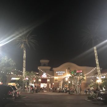 Yogurtland - On approach to Yogurtland at night.  Beautiful patio seating, full of families. - Ice Cream & Frozen Yogurt Near Me - Simi Valley, California