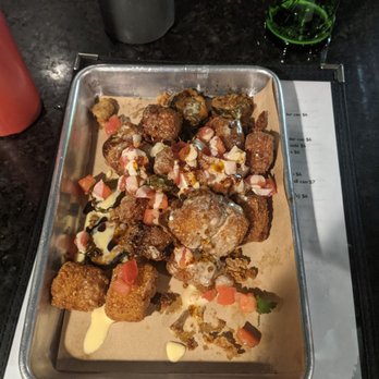Hammerheads - Grit Tots with fried pickles, Pico de Gallo and Cheddar Hollandaise sauce. - Southern Near Me - Louisville, Kentucky