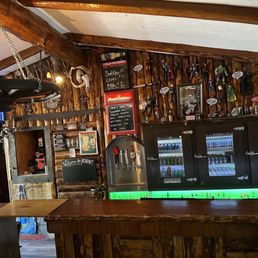 a bar with a variety of drinks a bar with a variety of drinks