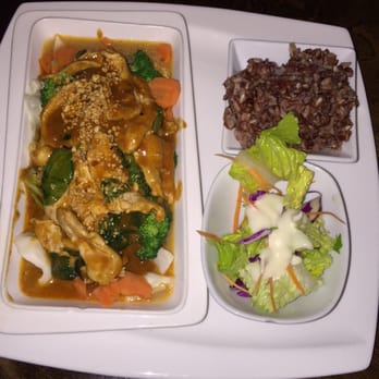 Thai House - Their Param Long Song chicken. A chili peanut sauce, delicious with their Madagascar pink rice! - Thai Near Me - Santa Rosa, California Thai House - Their Param Long Song chicken. A chili peanut sauce, delicious with their Madagascar pink rice! - Thai Near Me - Santa Rosa, California