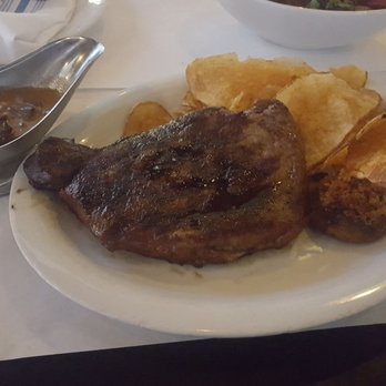 Echo & Rig - Ribeye with garlic potato chips and mushroom Rockefeller. Side sauce is brandied mushroom ($35.80) - Steakhouses Near Me - Las Vegas, Nevada