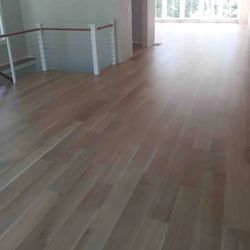 MCS Flooring - 7-in white oak unfinished sanded with water-based polyurethane.