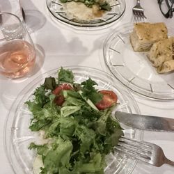 Salad and bread with entree.