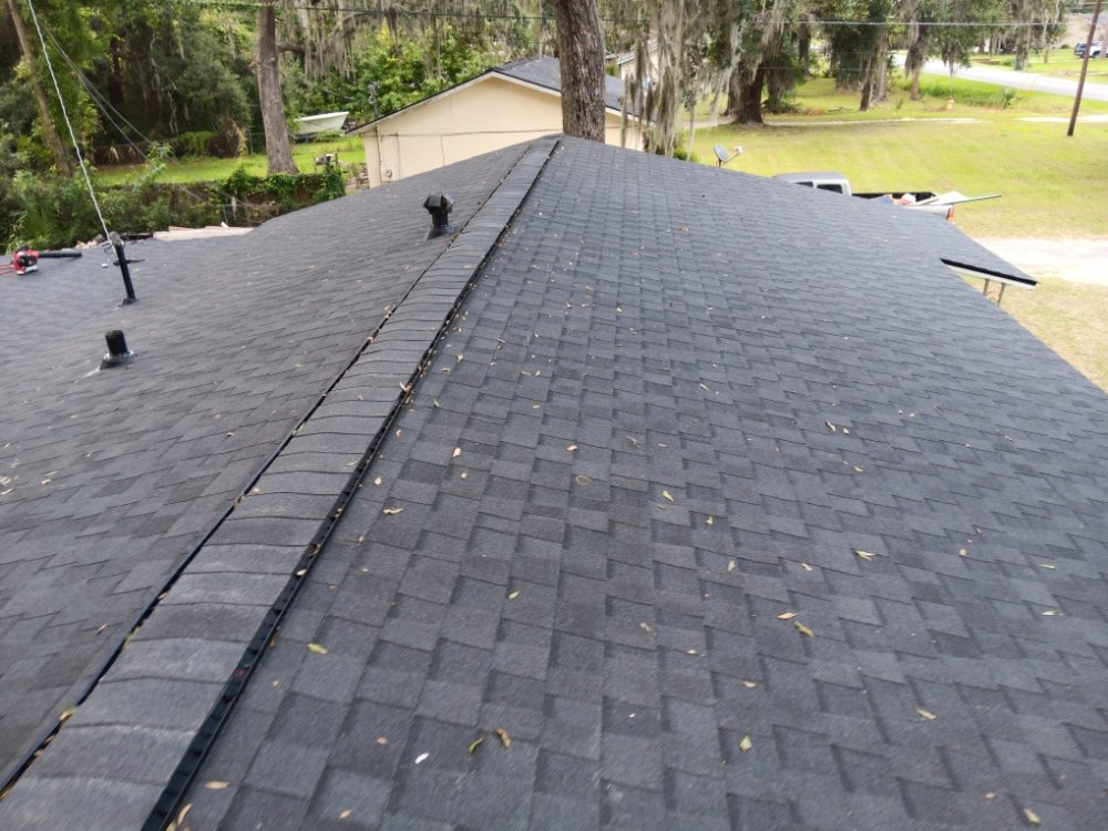 Slide of James Hudock roofing and repairs