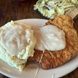 Press Box Grill & Bar - Breaded pork tenderloin with mashed potatoes and a wonderful country gravy.  You get an additional side also.