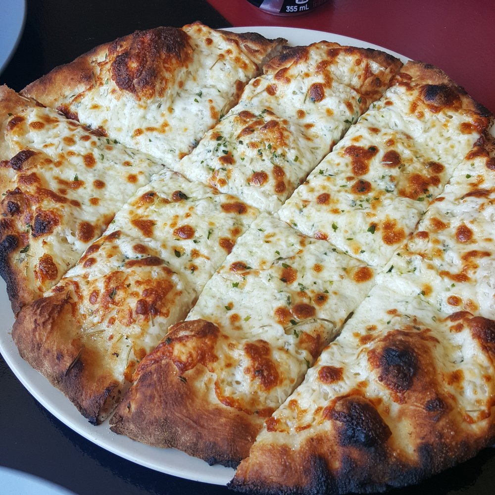Dino's Wood Burning Pizza - Garlic cheesy toast.. was sooo good! - Pizza Near Me - Toronto, Ontario Dino's Wood Burning Pizza - Garlic cheesy toast.. was sooo good! - Pizza Near Me - Toronto, Ontario