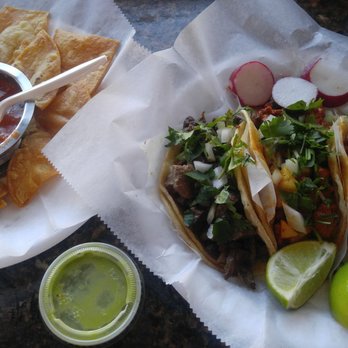 Aqui Es - Chips & Salsa with a $5 Taco Trio of Bistec, al Pastor, and Chorizo with a side of Salsa de Aguagates. - Mexican Near Me - Bethlehem, Pennsylvania Aqui Es - Chips & Salsa with a $5 Taco Trio of Bistec, al Pastor, and Chorizo with a side of Salsa de Aguagates. - Mexican Near Me - Bethlehem, Pennsylvania