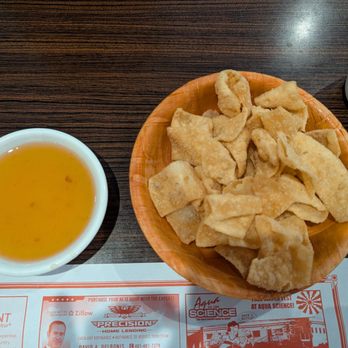 New Asia House - Appetizer with sweet and sour sauce, wonton strips - Sushi Bars Near Me - Warwick, Rhode Island New Asia House - Appetizer with sweet and sour sauce, wonton strips - Sushi Bars Near Me - Warwick, Rhode Island