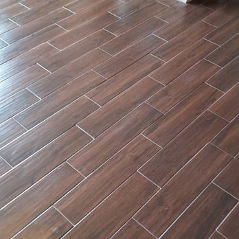 Floors By Matt - Porcelain wood-look plank tile from Serso in Black Walnut with Fusion grout in the color Sable. - Flooring Near Me - Mount Olive, Illinois
