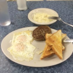 Galliano Truck Plaza & Casino - Two over medium, two sausage patties, grits and toast