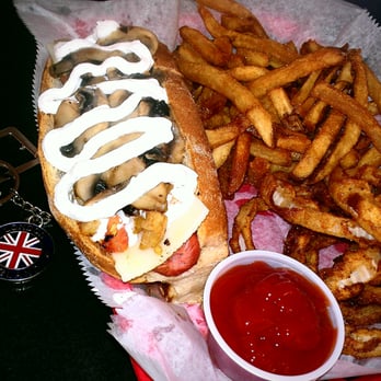 Coris DogHouse - The michigan with fried potatoes, tomatoes, sour cream n onion rings n fries - Hot Dogs Near Me - Mount Juliet, Tennessee Coris DogHouse - The michigan with fried potatoes, tomatoes, sour cream n onion rings n fries - Hot Dogs Near Me - Mount Juliet, Tennessee