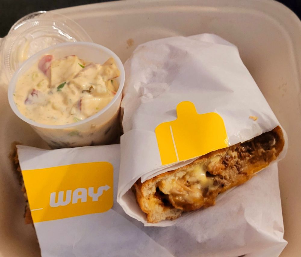 The Grub's On Wheels Logo