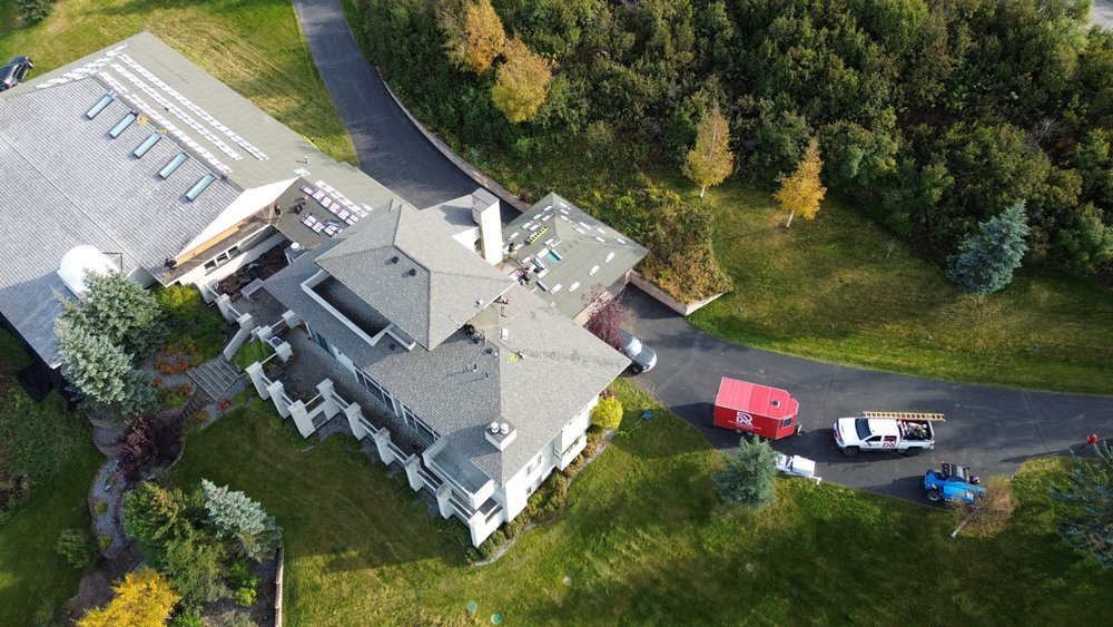 Slide of Reds Roofing & Renovations