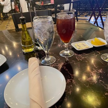 Pasta Cucina - Table setting with iced tea, water, and an extra glass of ice. - Italian Near Me - Henderson, Nevada