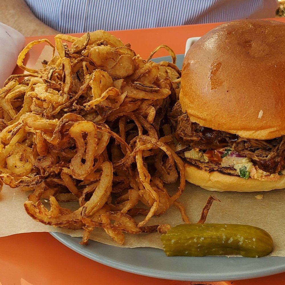 Corkscrew Cafe - Pulled pork sandwich on a soft bun. Cloth napkins are perfect for this sandwich. - American Near Me - Carmel Valley, California