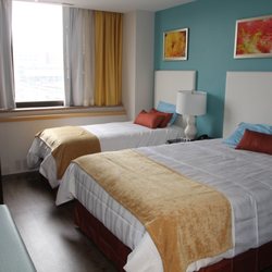 Each bedroom has a private bathroom attached.