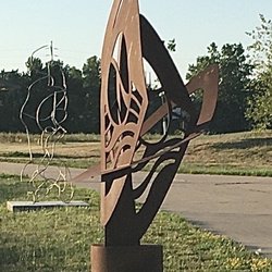 Riverfront Crossings Park - If it looks like some industrial castoff but it's on a concrete pad and has a label, it's modern sculpture.