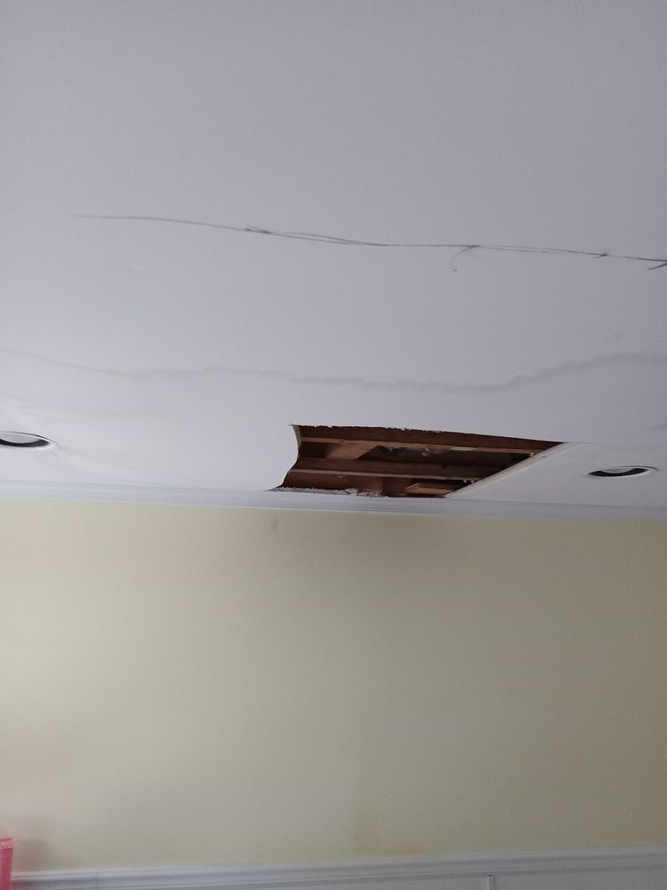 Slide of J&S handyman helping hands