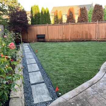 Tnt  construction Landscaping Services -  backyard with a lawn and landscaping - Landscaping Near Me - Lynnwood, Washington