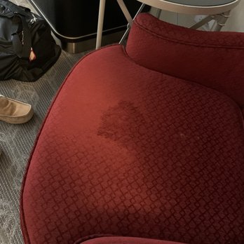 JW Marriott Chicago - Huge stain in center of chair, this chair is completely dry, not wet with hard white stuff on the right side - Hotels Near Me - Chicago, Illinois