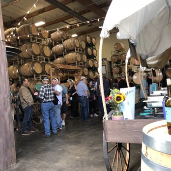 Malm Cellars - a large group of people standing in front of barrels - Wineries Near Me - Healdsburg, California Malm Cellars - a large group of people standing in front of barrels - Wineries Near Me - Healdsburg, California