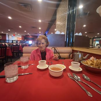 Kwong Ming Restaurant - a woman sitting at a table - Chinese Near Me - Wantagh, New York Kwong Ming Restaurant - a woman sitting at a table - Chinese Near Me - Wantagh, New York