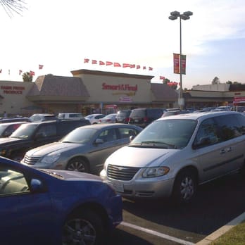 Smart & Final Extra! - a parking lot full of cars - Grocery Near Me - Vista, California