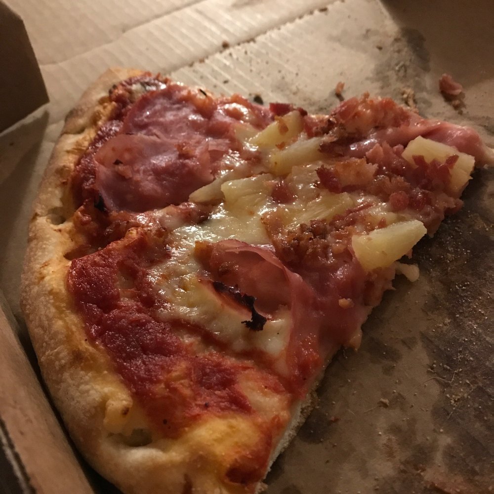 a slice of pizza in a box a slice of pizza in a box