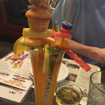 Hell's Kitchen - Mimosa with fruit, sweets, and candy - New American Near Me - Minneapolis, Minnesota