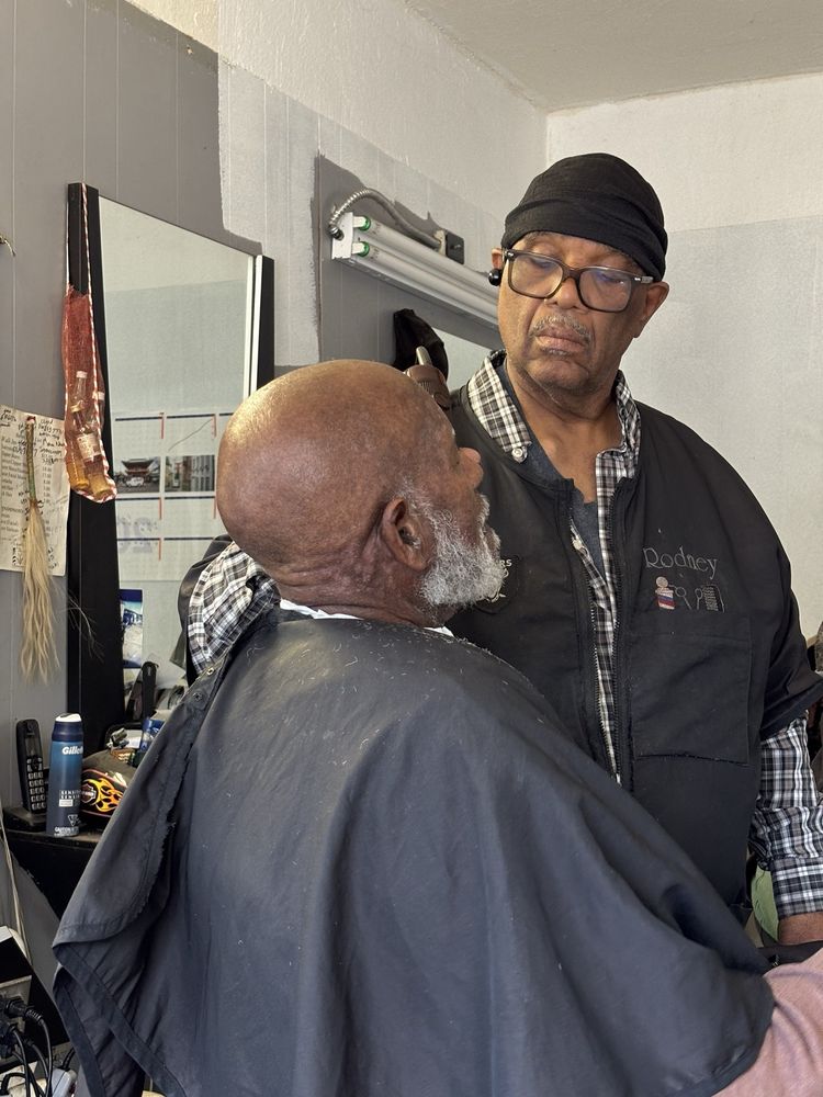 Rodney's Barber & Beauty Shop Logo