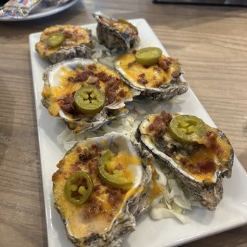 Beach Camp Brewpub - Destin - Smoked cheddar oysters - Brewpubs Near Me - Destin, Florida Beach Camp Brewpub - Destin - Smoked cheddar oysters - Brewpubs Near Me - Destin, Florida