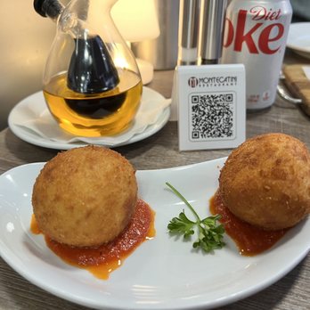 Montecatini Restaurant - Risotto balls with marinara sauce - Italian Near Me - Miami, Florida Montecatini Restaurant - Risotto balls with marinara sauce - Italian Near Me - Miami, Florida