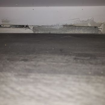 Cali First Remodel - Under the sink.  They removed the floor molding & left this whole. - General Contractors Near Me - Marina del Rey, California