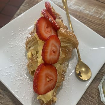Merci Café - Cream filled croissant - Coffee & Tea Near Me - Sarasota, Florida Merci Café - Cream filled croissant - Coffee & Tea Near Me - Sarasota, Florida