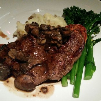 Seasons 52 - Filet (butterflied) with broccolini - New American Near Me - Altamonte Springs, Florida Seasons 52 - Filet (butterflied) with broccolini - New American Near Me - Altamonte Springs, Florida