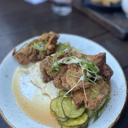Jidori Free Range Fried Chicken: "anson mills" heirloom grits, bread & butter pickles, chile de árbol honey, scallions