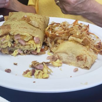 Sweet Desert Cafe - Breakfast crepe with ham and eggs with hashbrowns. She loved it as y'all can tell. - Cafes Near Me - Tempe, Arizona Sweet Desert Cafe - Breakfast crepe with ham and eggs with hashbrowns. She loved it as y'all can tell. - Cafes Near Me - Tempe, Arizona
