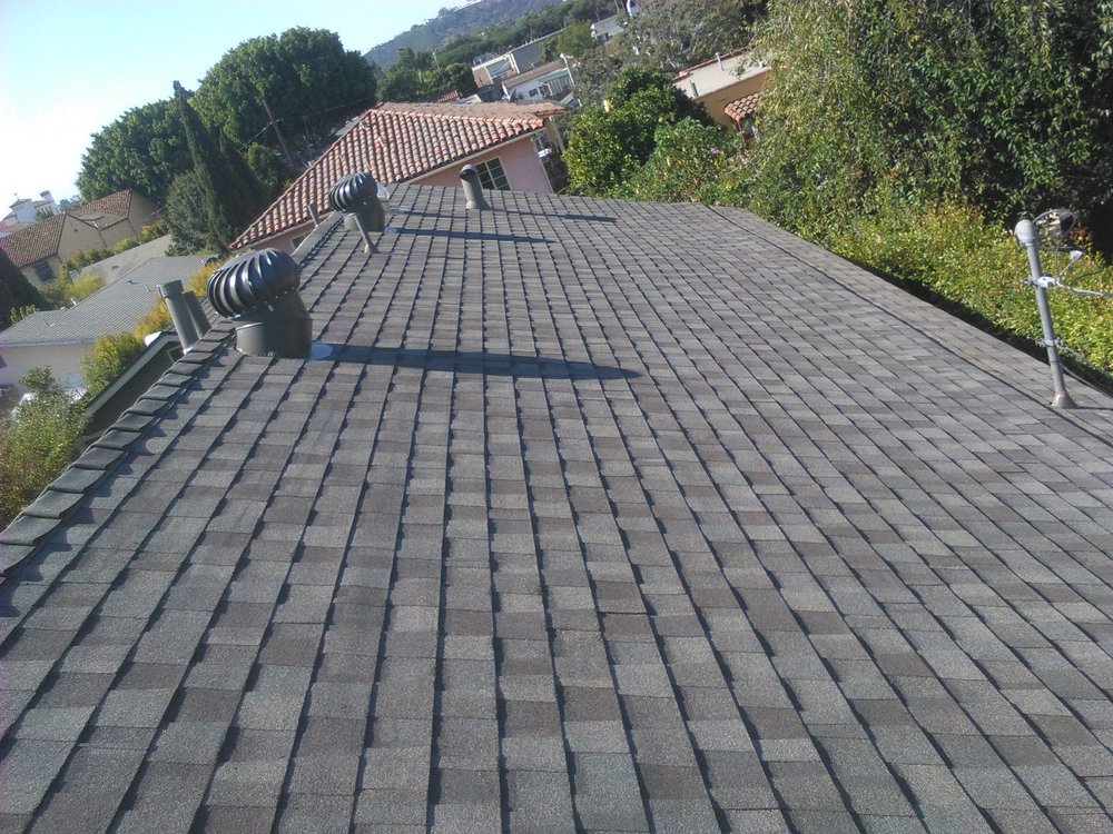 Slide of Titan Roofing & Rain Gutters Inc.