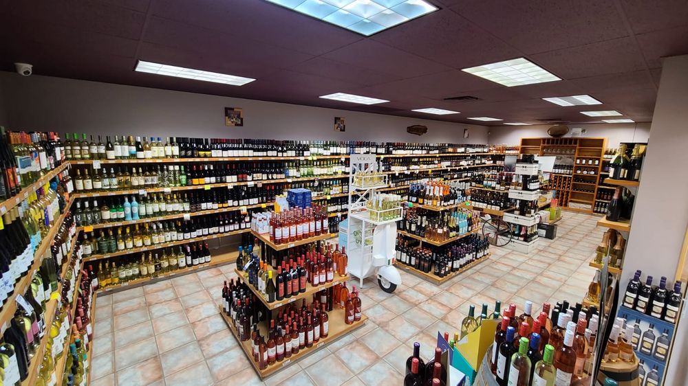 Sartell Liquor Logo