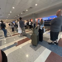 Budget - People are standing waiting for rental cars because this location does not have vehicles and is understaffed. The wait times are 1-2 hours.